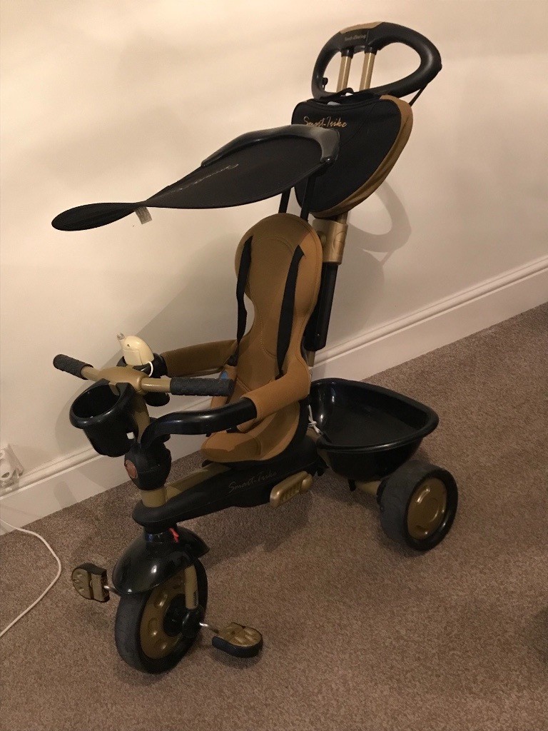 smart trike black and gold